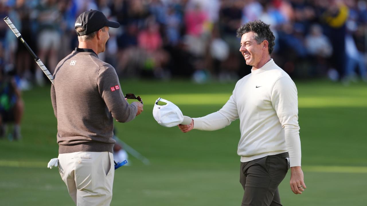 Adam Scott and Rory McIlroy 