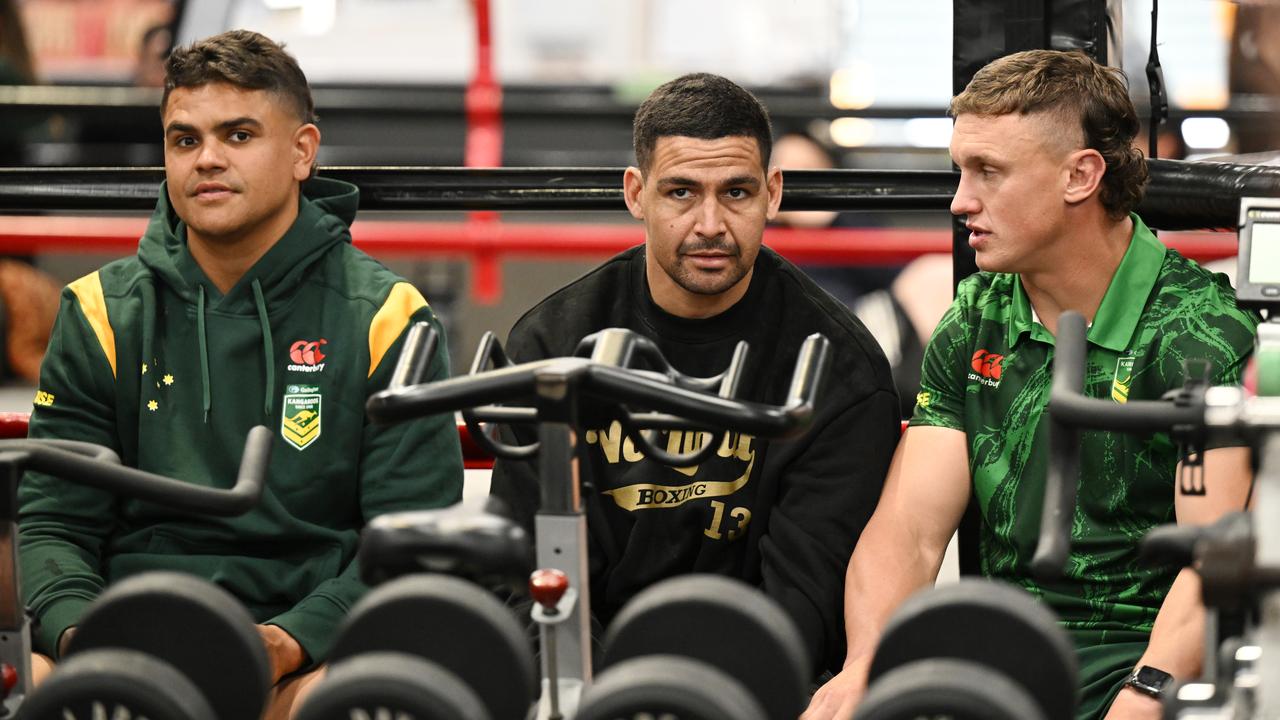 Cody Walker and Jack Wighton feel for Latrell Mitchell