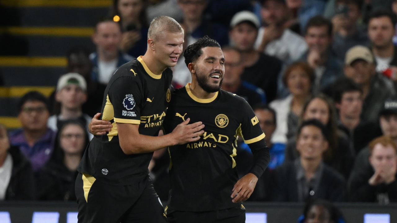 Erling Haaland and Rayan Cherki