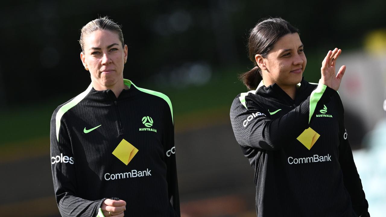 Kerr enjoys a moment at Leichhardt Oval on Tuesday with Matildas central defender Alanna Kennedy