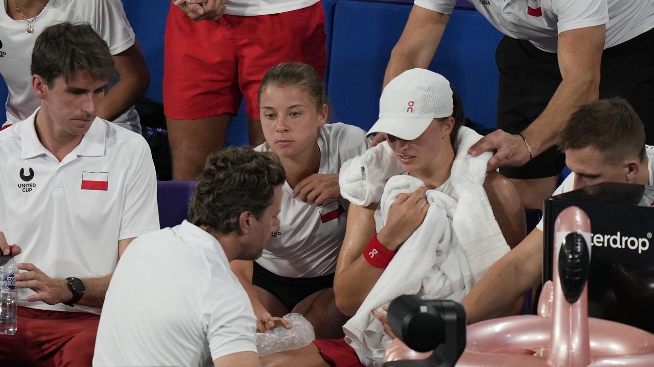 Swiatek had ice applied to her leg during her United Cup clash with Coco Gauff