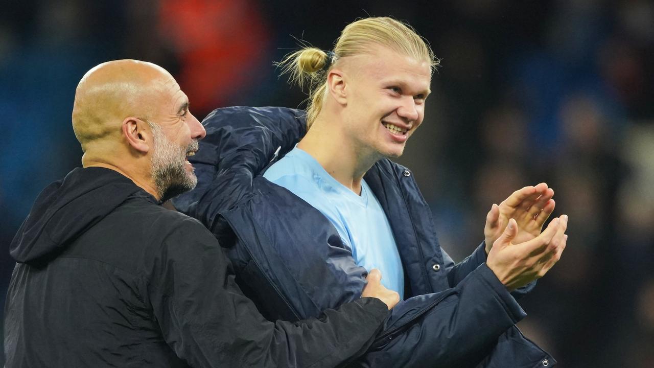 Pep Guardiola and Erling Haaland
