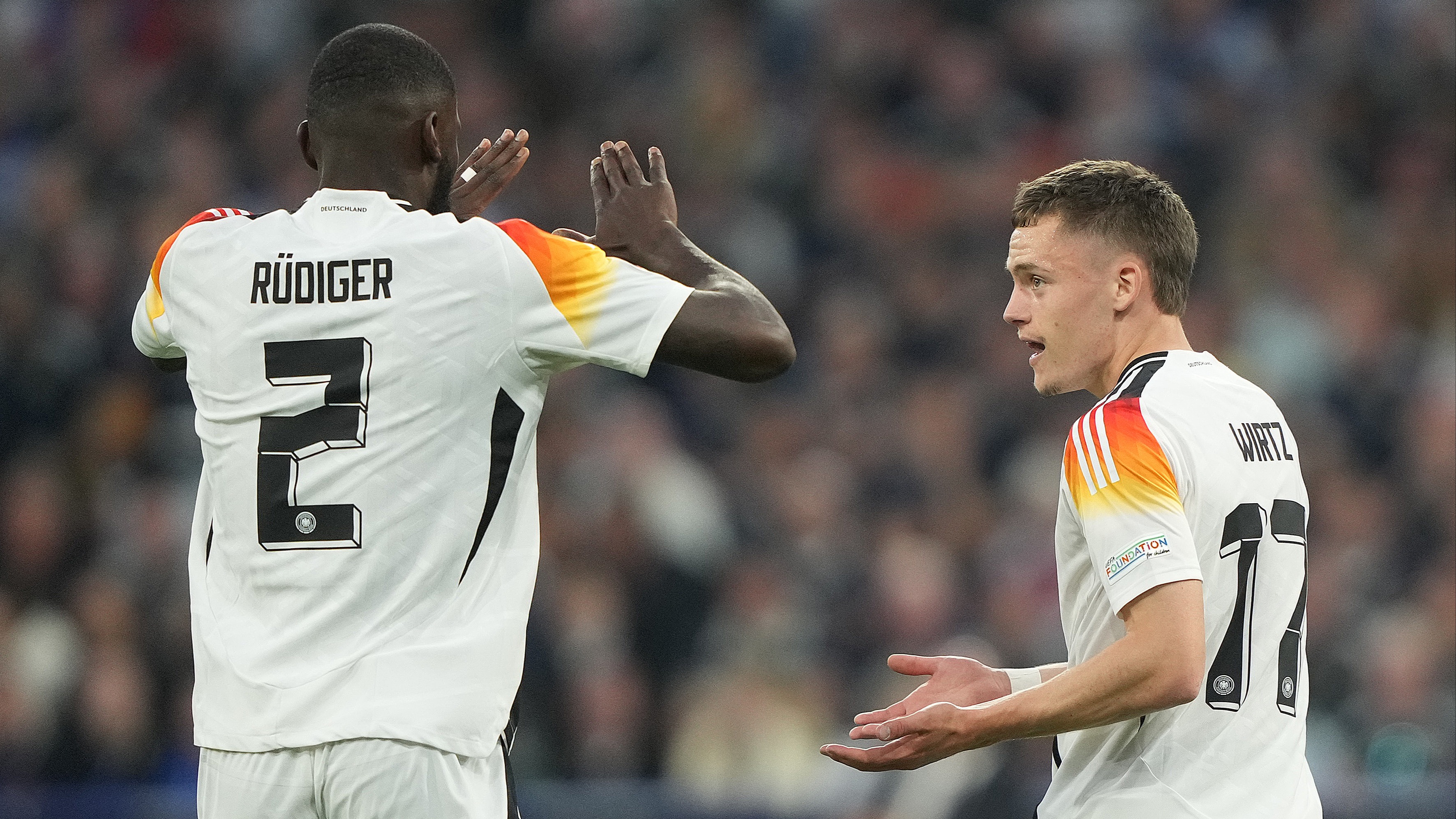 Germany's Antonio Rudiger and Florian Wirtz