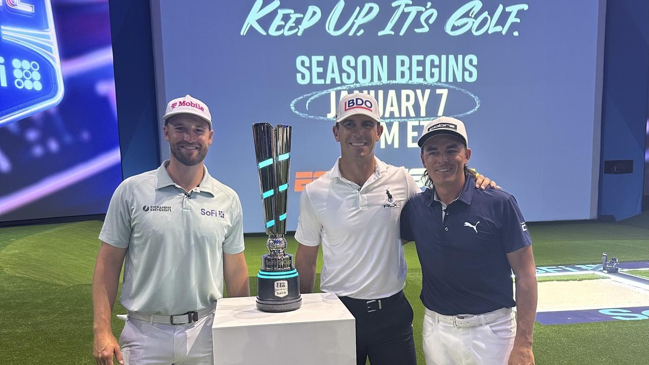 Wyndham Clark, Billy Horschel and Rickie Fowler pose with the SoFi Cup