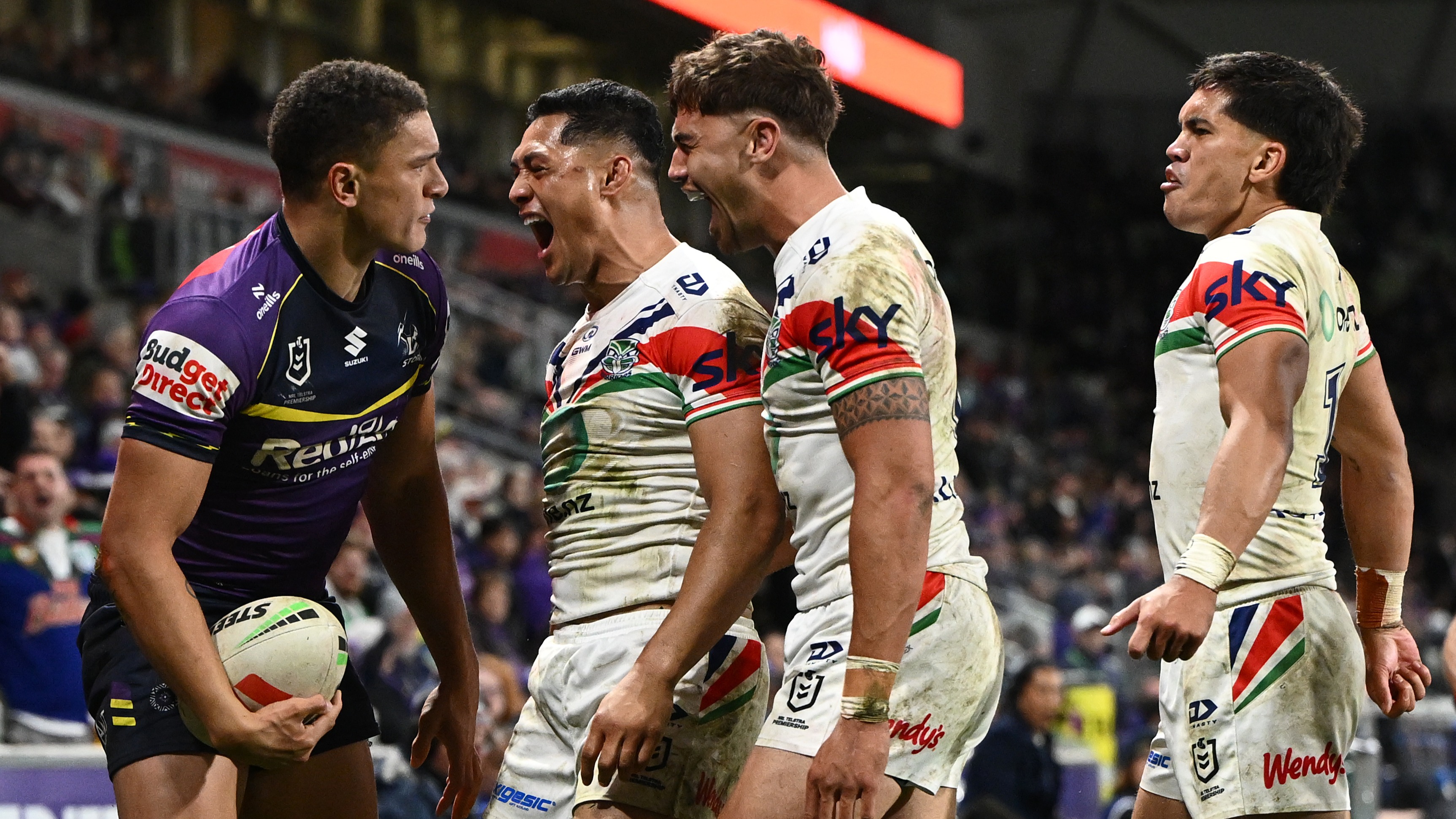 Roger Tuivasa-Sheck celebrates his try-saving tackle against Will Warbrick