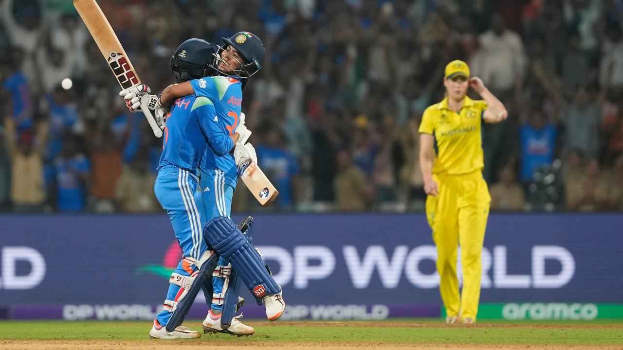 Jemimah Rodrigues and Amanjot Kaur embrace after India defeated Australia in the semi-final