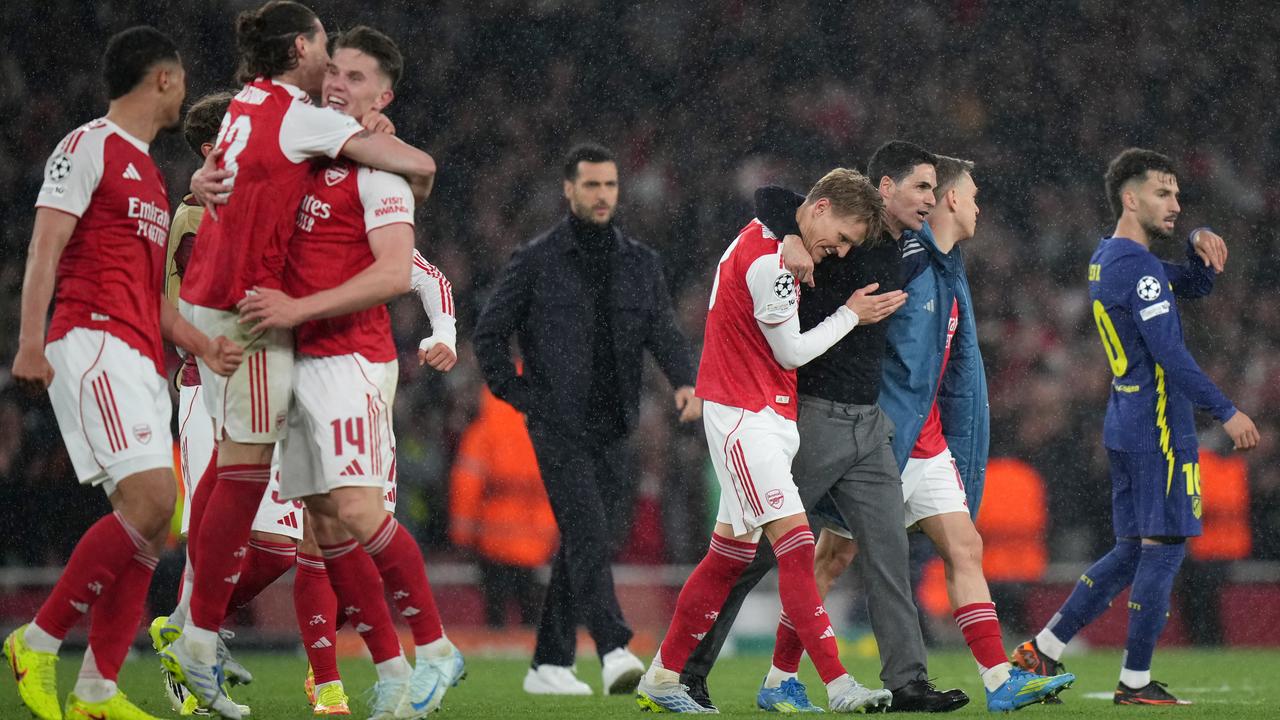 Arsenal manager Mikel Arteta , Martin Odegaard and Leandro Trossard 