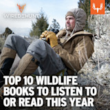 TOP 10 WILDLIFE BOOKS TO LISTEN TO OR READ THIS YEAR — man in tan jacket holding binoculars reclining in sagebrush