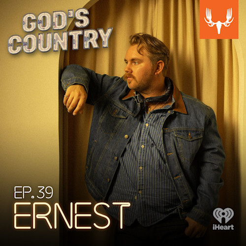"GOD'S COUNTRY" and "EP.39 ERNEST" text overlay; man in denim jacket leaning in doorway