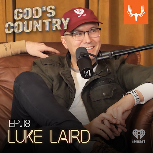 Man in maroon cap and glasses speaking into mic on couch; text: GOD'S COUNTRY, EP.18 LUKE LAIRD