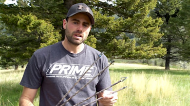 Archer holding four arrows with broadheads, wearing 'PRIME' T-shirt, MeatEater logo overlay