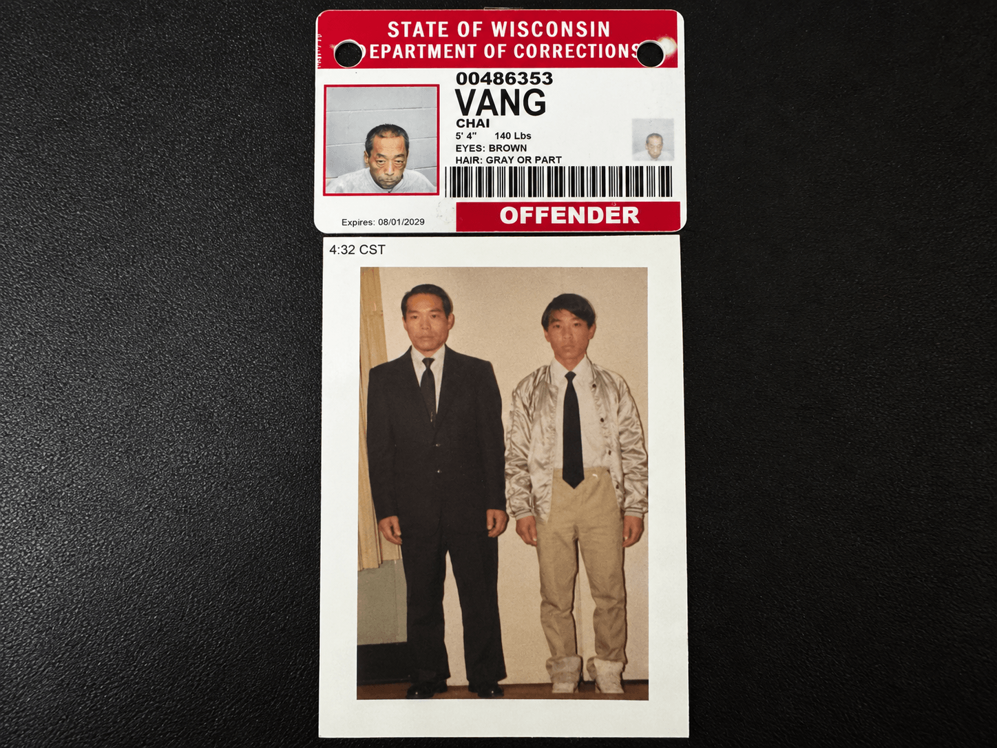 Wisconsin Department of Corrections ID reading "VANG CHAI" OFFENDER; below, photo of two men, "4:32 CST"