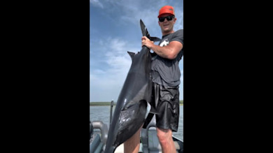 Oklahoma Guide Catches Rare Melanistic Paddlefish