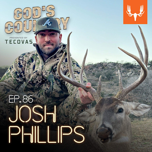 GOD'S COUNTRY EP.86 JOSH PHILLIPS — man in camo jacket holding a large buck with antlers