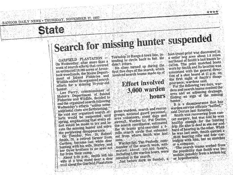 Newspaper clipping: "Search for missing hunter suspended" — Bangor Daily News, Nov 27, 1997
