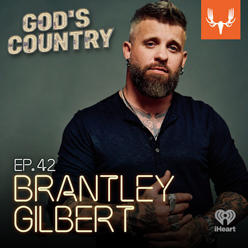 Bearded tattooed man in dark shirt; overlays read "GOD'S COUNTRY", "EP.42"; MeatEater and iHeart logos