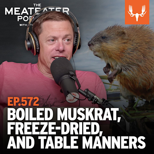 Man with headphones speaking into mic beside muskrat; text 'EP.572 BOILED MUSKRAT, FREEZE-DRIED, AND TABLE MANNERS'