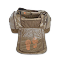 Tan duffel with fold-out boot compartment showing orange footprint graphics and First Lite logo