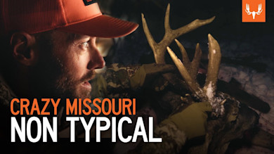 Hunter holding non-typical deer antlers at night, overlay text "CRAZY MISSOURI NON TYPICAL"