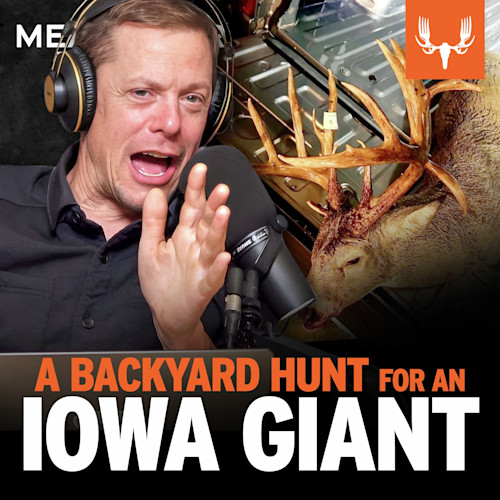 Man speaking into microphone beside a large-antlered deer in a truck bed; text "A BACKYARD HUNT FOR AN IOWA GIANT"
