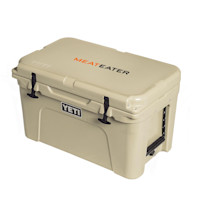 Tan YETI Tundra 45 cooler with MEATEATER printed on lid