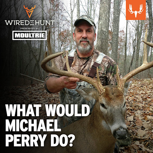 Hunter holding a buck with large antlers in leaf-strewn woods; overlay text "WHAT WOULD MICHAEL PERRY DO?"