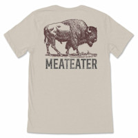Back of beige T-shirt with brown bison illustration above text MEATEATER