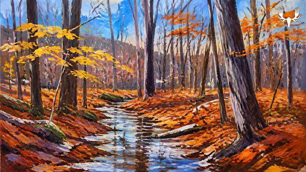 Autumn woodland stream reflecting sky, bare trees and orange leaf cover