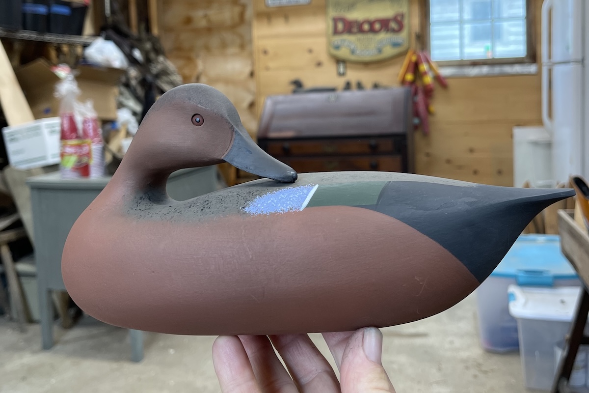 hunting over wooden decoys