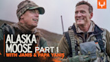 Two hunters in camouflage smiling; overlay text "ALASKA MOOSE PART 1 WITH JANIS & PAPA YANIS"