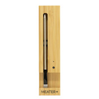 Meater+ Bluetooth meat thermometer probe in bamboo charging block, text "MEATER+" visible