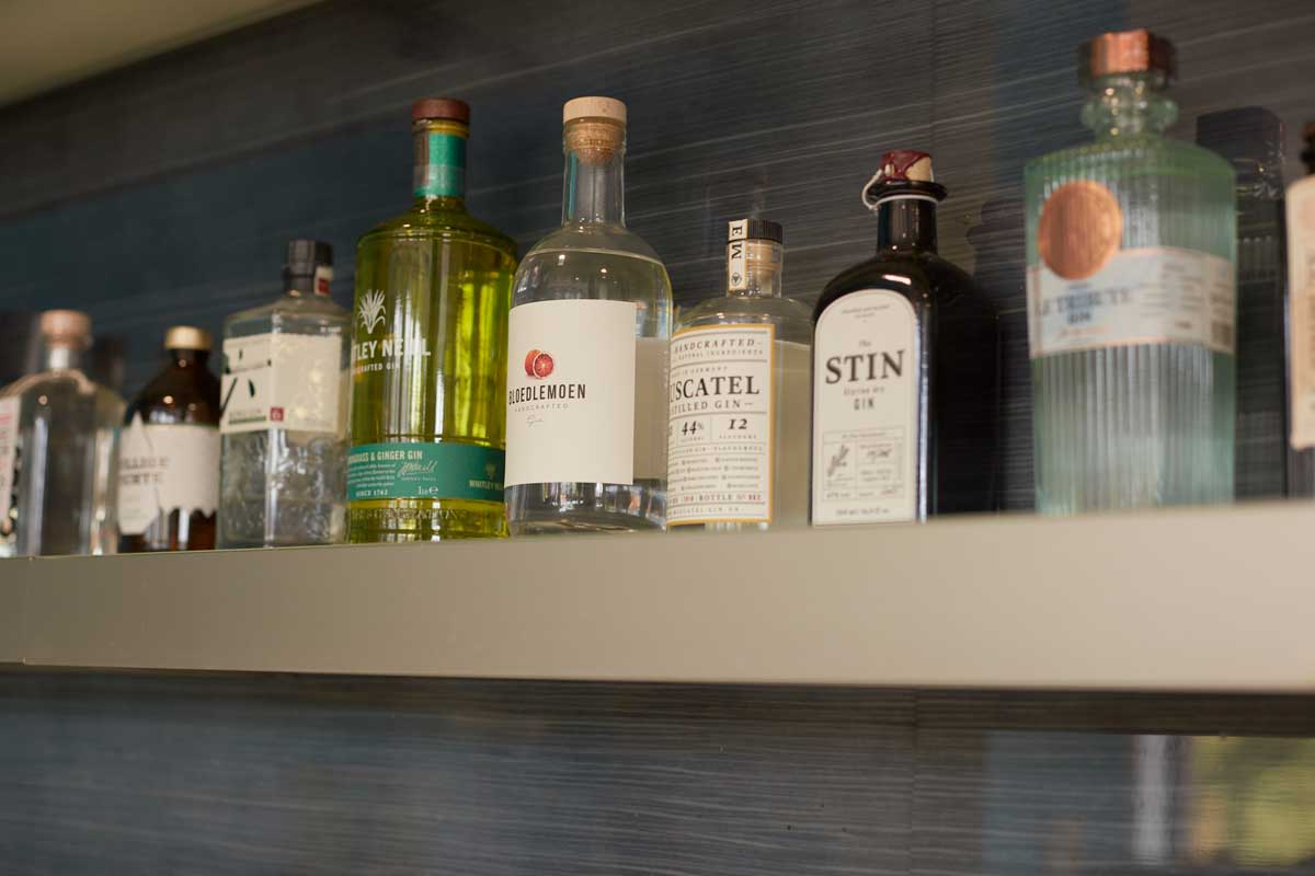 We keep our office bar stocked with at least thirty varieties of gin.