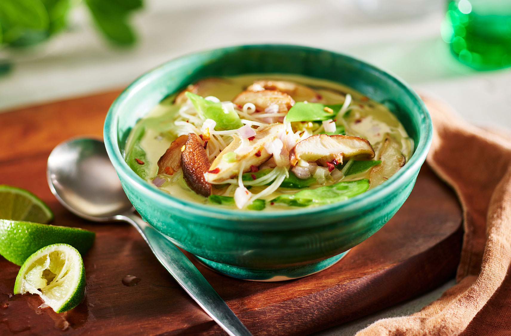 A Thai inspired bowl of creamy noodle soup made with plant-based chicken=less broth, veggies and angel hair pasta