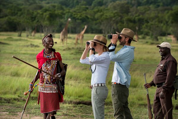 Kenya-Kichwa-Experiences-Walking-safari-two-guests-with-binoculars-and-Maasai-and-guide