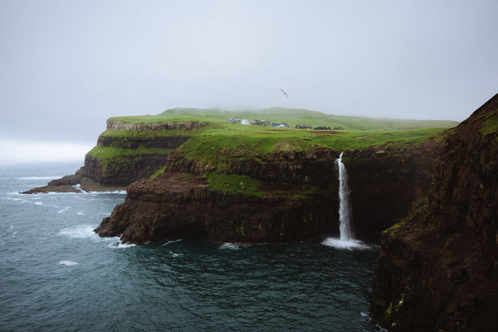 Sea cliffs with waterfall 