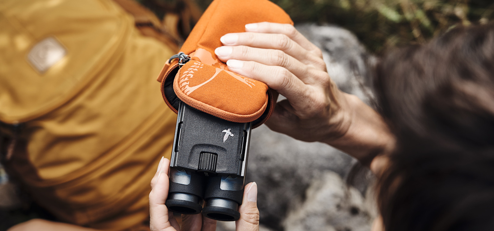 Swarovski Optik CL Pocket binoculars with case · official image in its environment