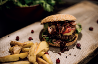 GAME MEAT BURGER WITH APPLE-RED CABBAGE-SLAW AND (SWEET) POTATO WEDGES BY MARKUS SÄMMER image