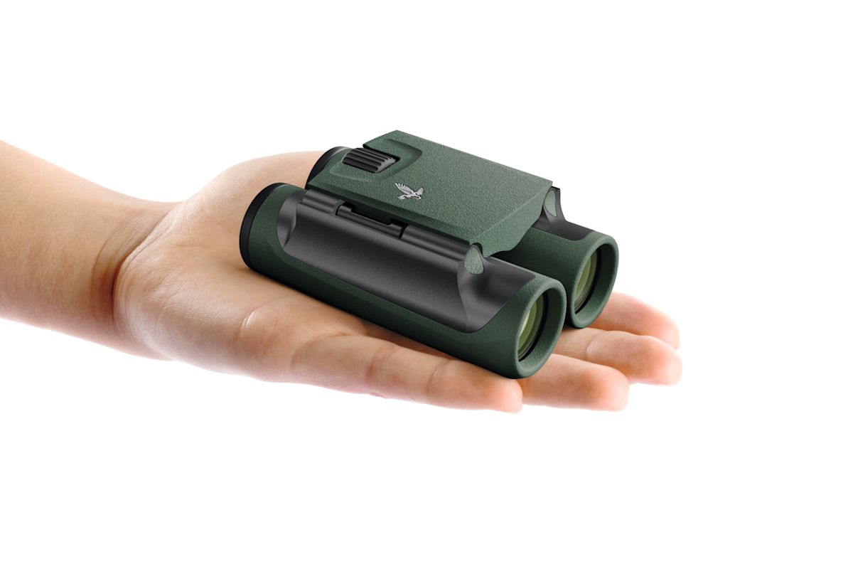 Swarovski CL Pocket held in the hand — compact grip