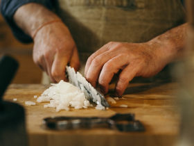 The ingenuity of a hunter and chef - Nikolaj Juel Recipe: Jamaican Chamois Curry - cutting onions 