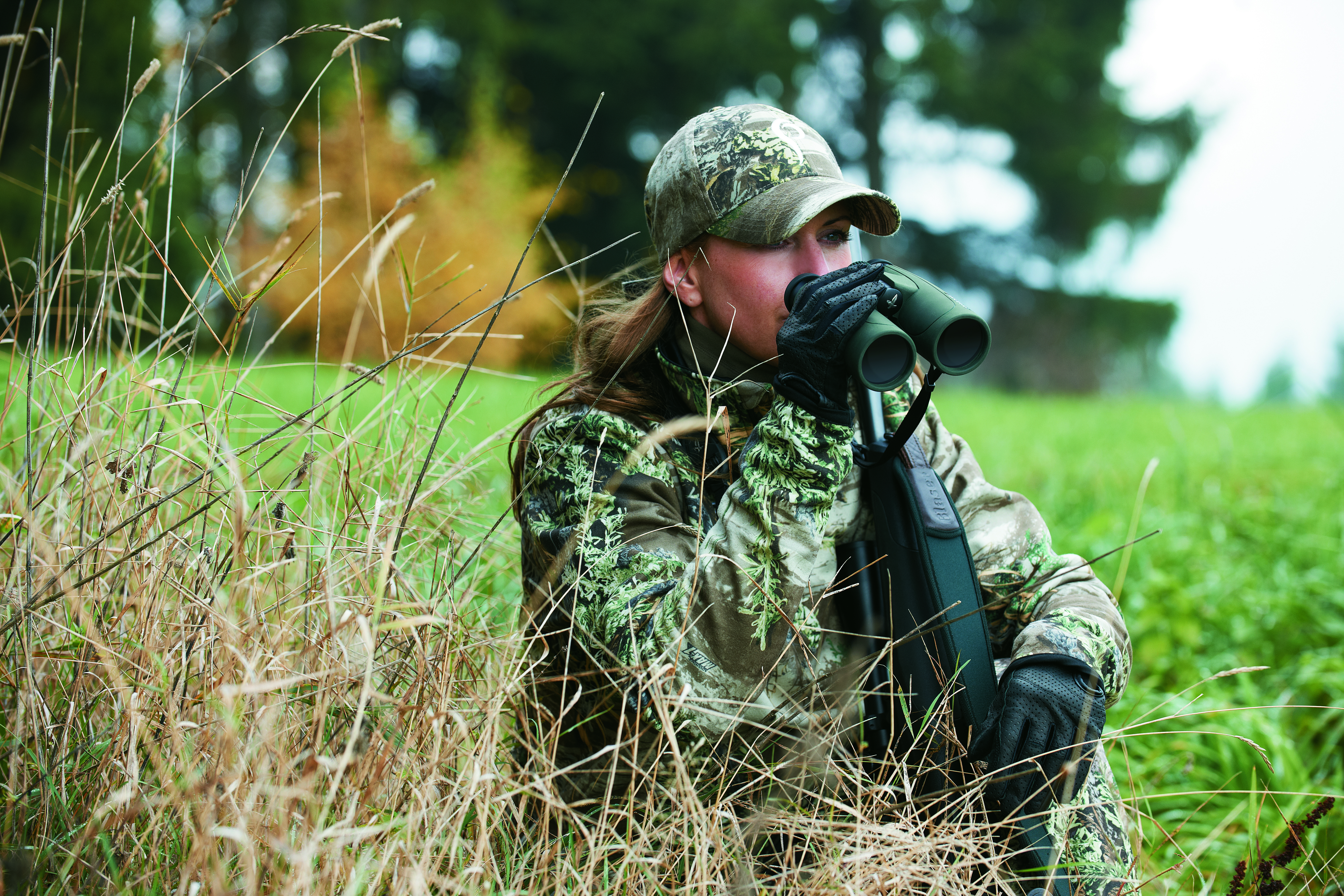 SLC 42 in use woman with riffle