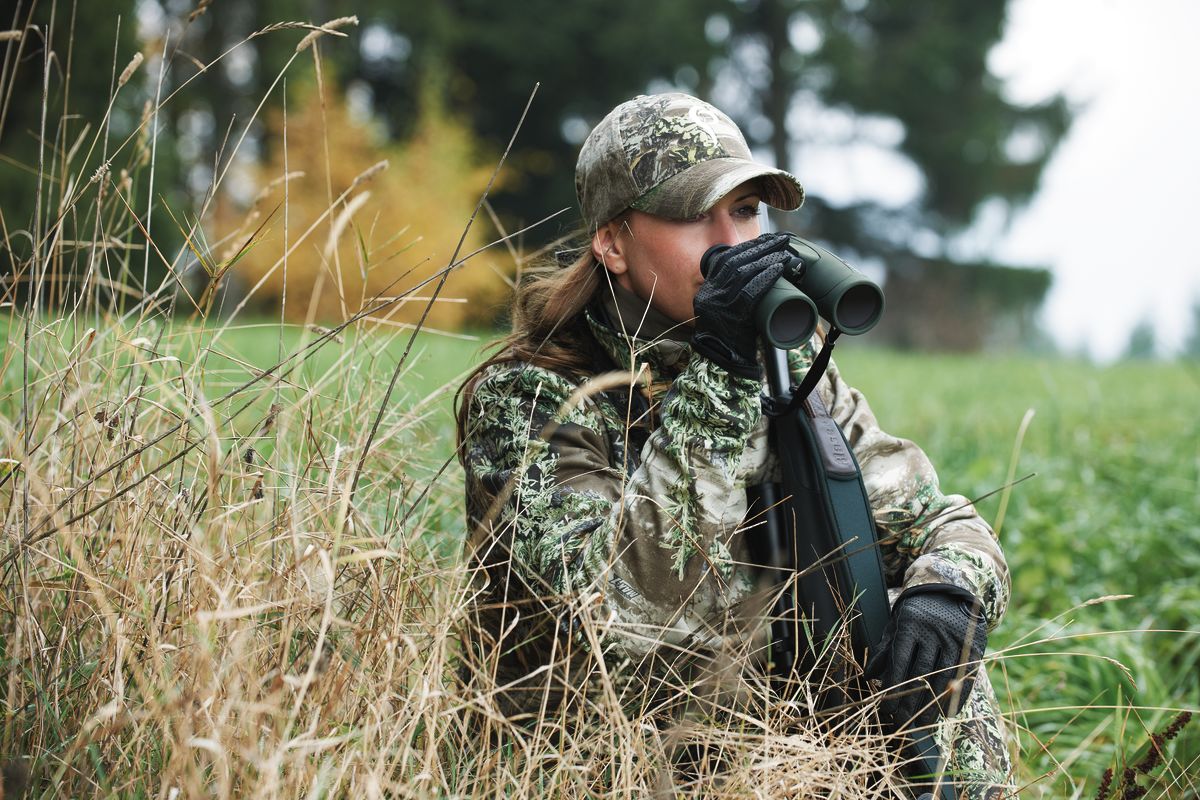 SLC 42 in use woman with riffle