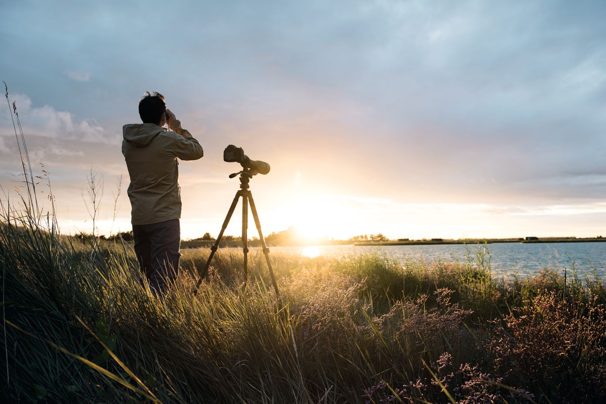 Telescope, man, sunset