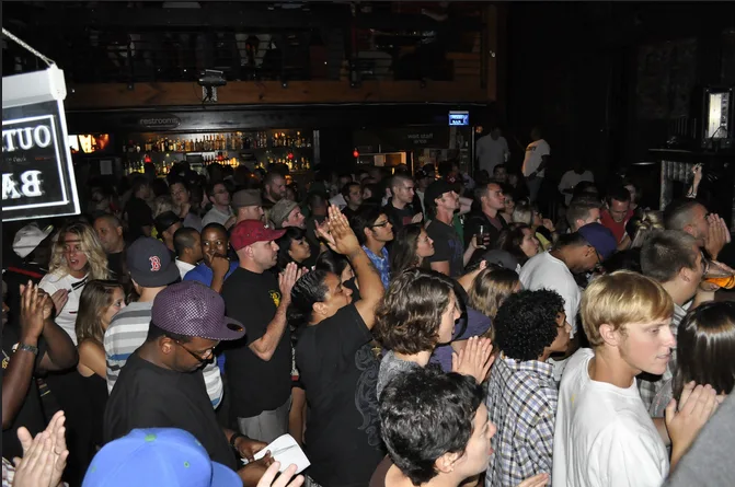 Crowd packed into Nectar Lounge in Seattle with hands raised at Winter Classic 2009