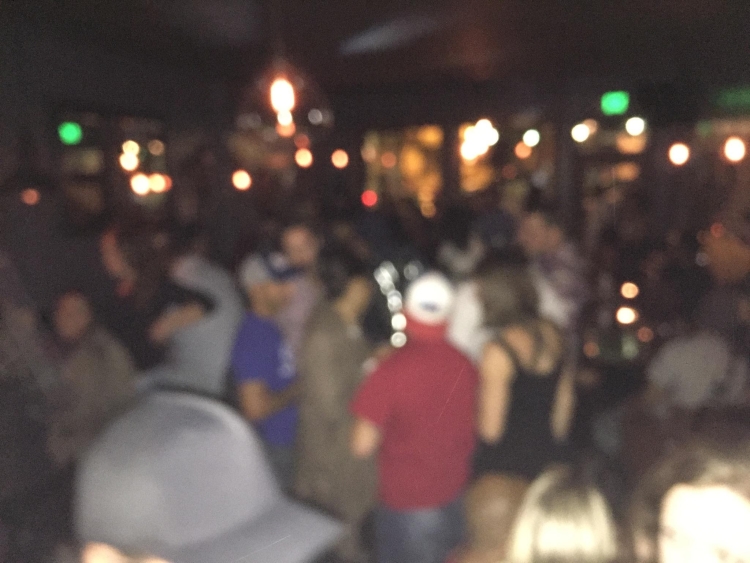 Blurry but cool photo of the crowd at Vittles in Belltown
