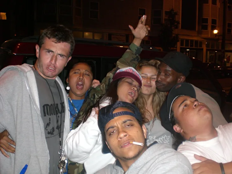Group of friends posing outside the Maharaja Cuisine of India restaurant in Capitol Hill, Seattle on a night out — from left to right: Benny Audeos, Hailstorm, Nindgee, Jerm D, Ioana, Rajni, and Alain