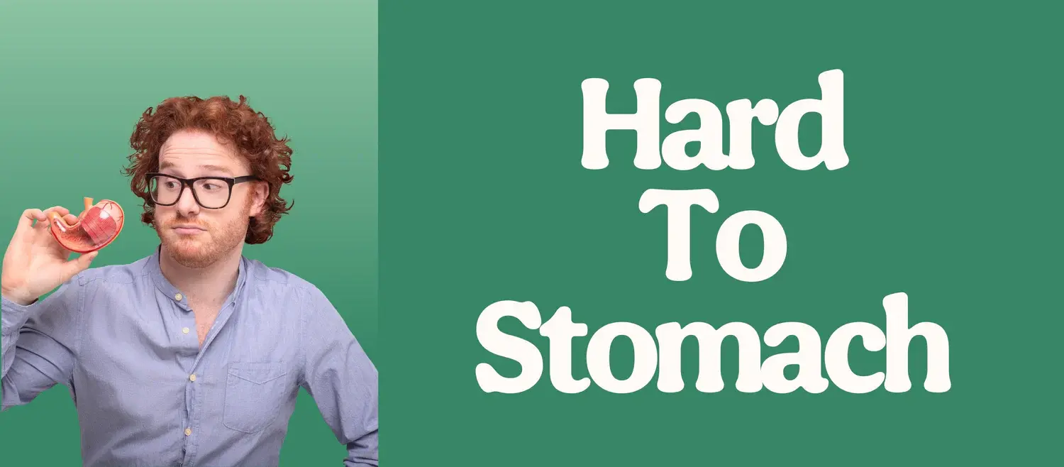 A person wearing glasses and a blue button‑down shirt holding a red anatomical stomach model, positioned beside large white text reading “Hard To Stomach” on a green background split into light and dark tones.