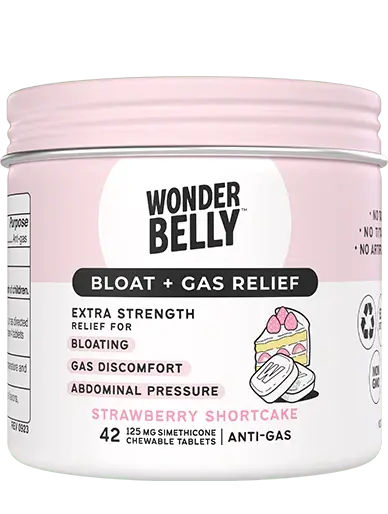 Wonderbelly bloat and gas relief jar labeled “Strawberry Shortcake,” featuring extra‑strength simethicone chewable tablets for gas discomfort and abdominal pressure, shown isolated on a plain background.