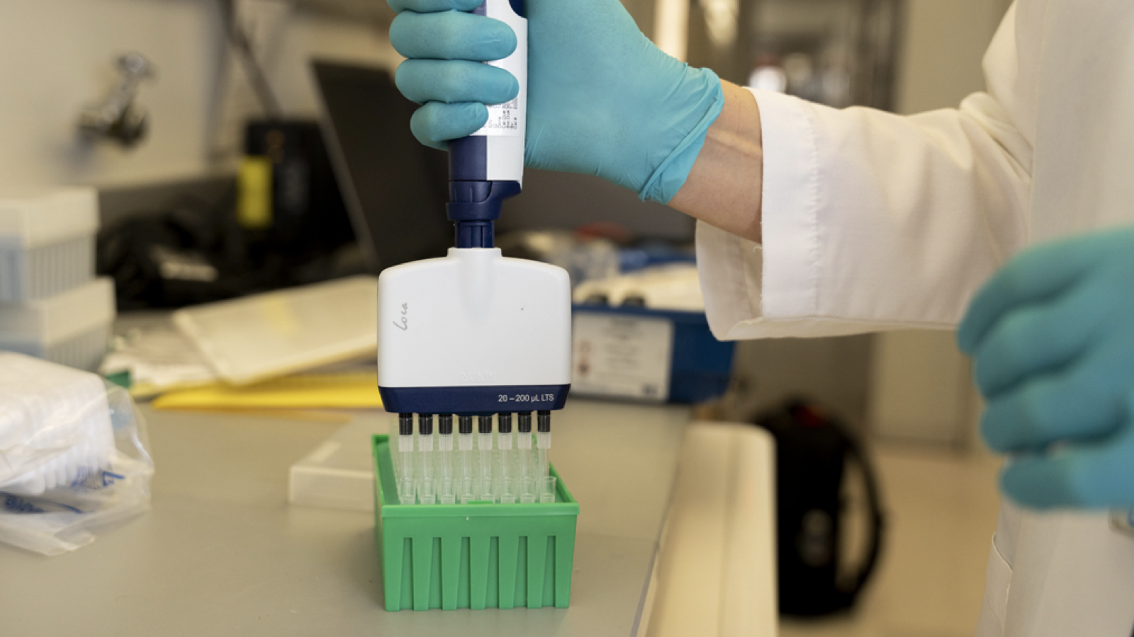 Technician using multi-syringe