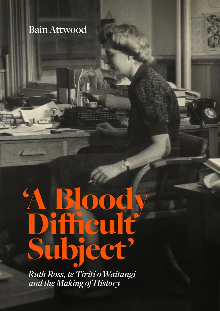 Book cover showing a woman sitting at a desk with a typewriter with orange text overlaid 'A Bloody Difficult Subject'.