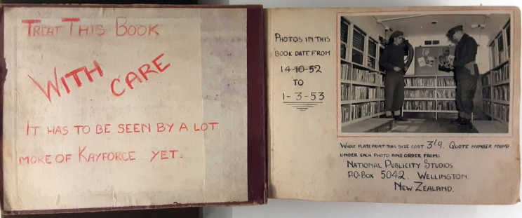 First two pages of the photo album with handwritten messages in red and black ink including a black and white photo.